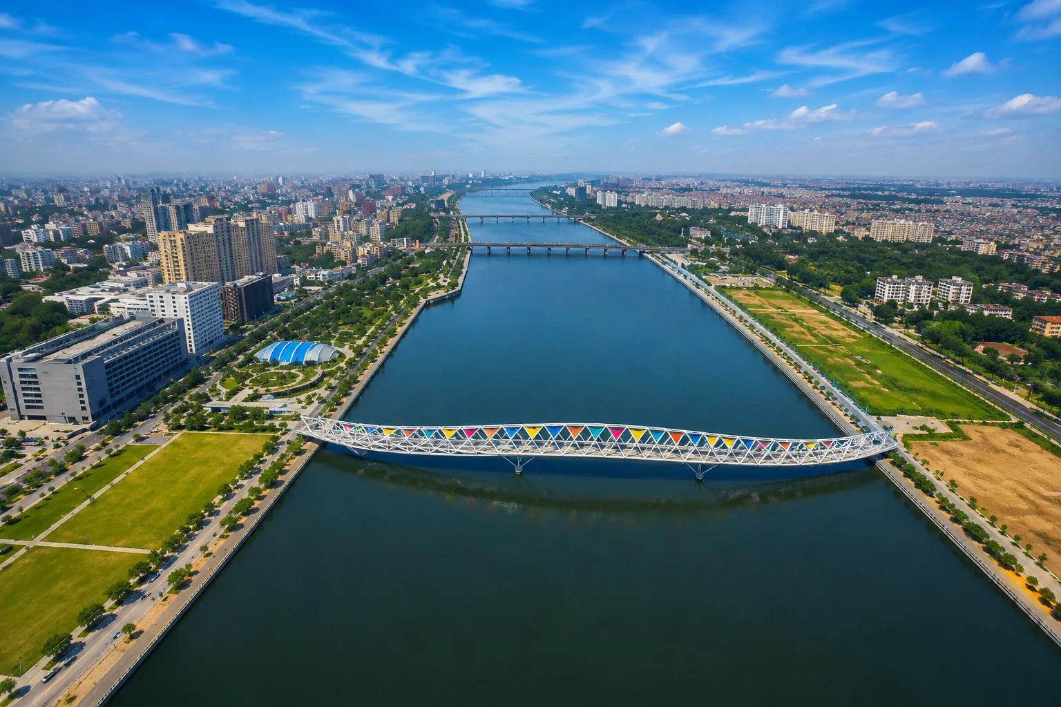 Aerial view of Ahmedabad's Sabarmati Riverfront and pedestrian bridge
